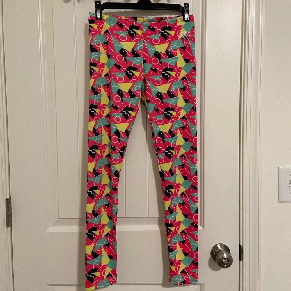 EUC | Dolfin girl’s Uglies patterned drag swim pants —‎ large